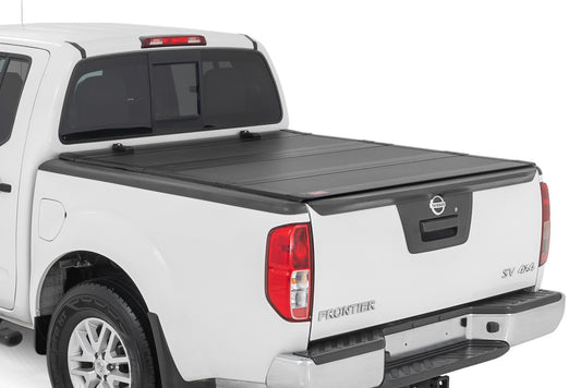 Rough Country Hard Tri-Fold Flip Up Bed Cover | 5' Bed | Nissan Frontier 2WD/4WD (05-21)