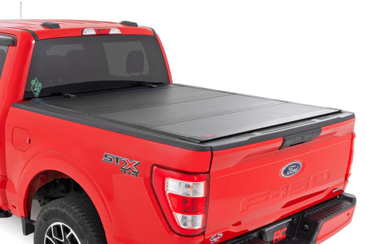Rough Country Hard Tri-Fold Flip Up Bed Cover | 5'7" Bed | Ford F-150 2WD/4WD (2015-2020)