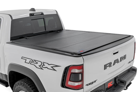 Rough Country Hard Tri-Fold Flip Up Bed Cover | 6'4" | Ram 1500 (19-24)/1500 TRX (21-24) 
