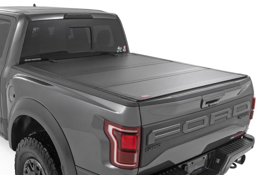 Rough Country Hard Tri-Fold Flip Up Bed Cover | 5'7" Bed | Ford F-150 (21-24)/F-150 Lightning (22-24) 