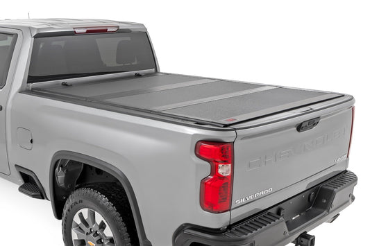Rough Country Hard Tri-Fold Flip Up Bed Cover | 6'9" Bed | Chevy/GMC 2500HD (20-24)